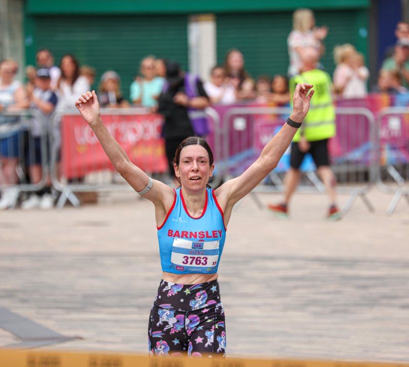 Other image for Charity runner beats cyclist to line while Vicky is first woman home